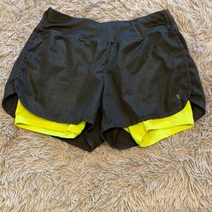 Layered active shorts, yellow with gray mesh